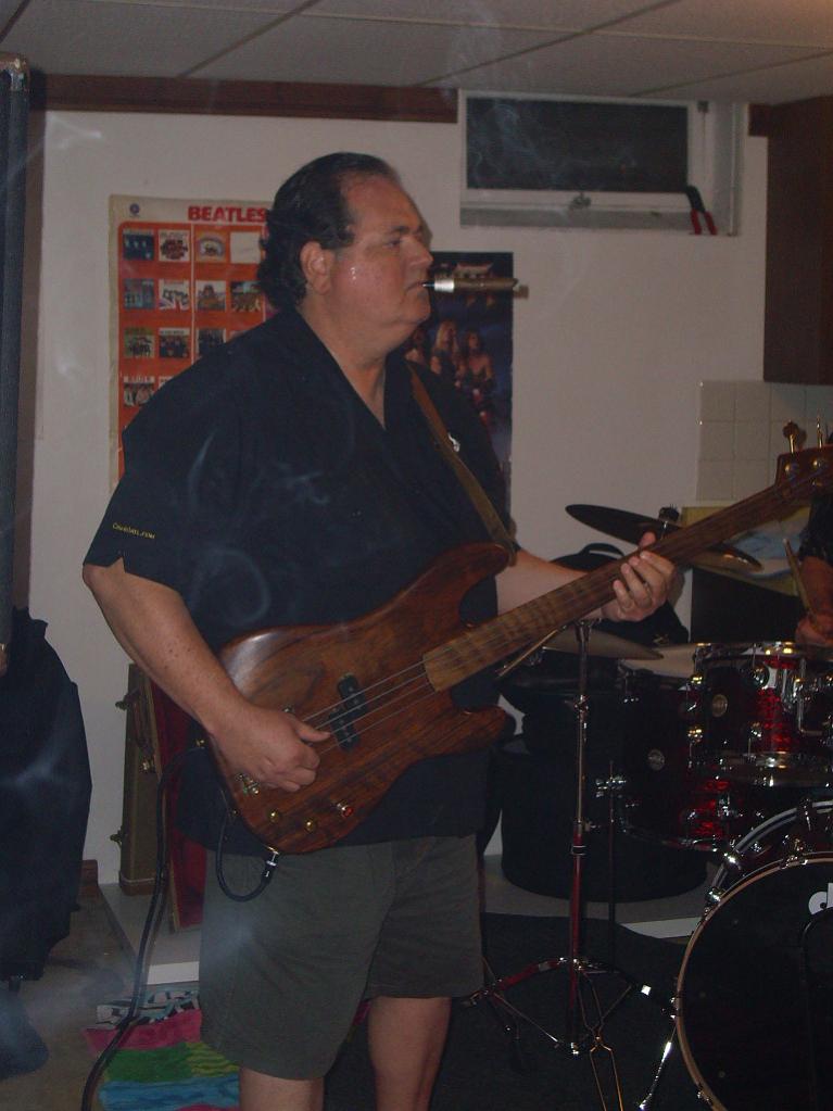 Name:  Phil on bass.jpg
Views: 347
Size:  71.2 KB